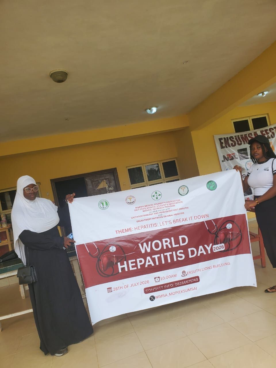 EKSUMSA members with the World Hepatitis Day banner